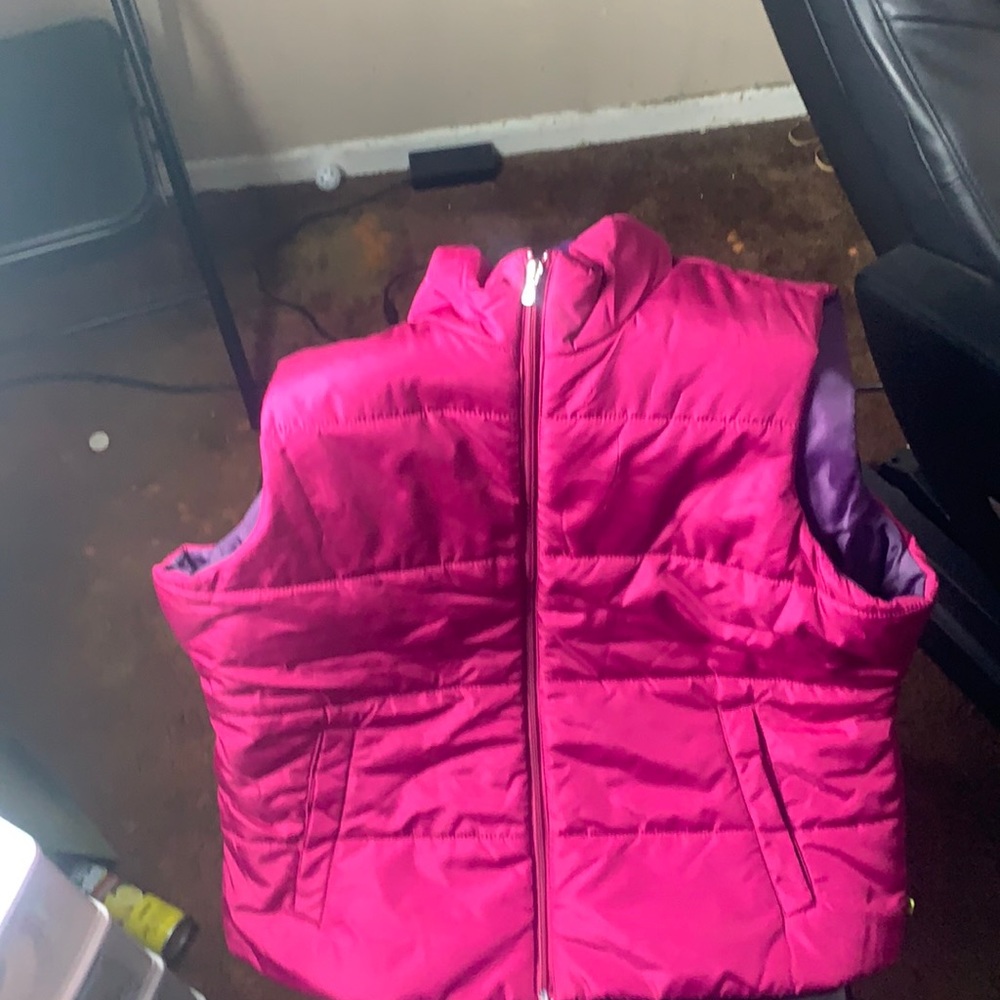 Hot pink vest , purple on the inside , great item